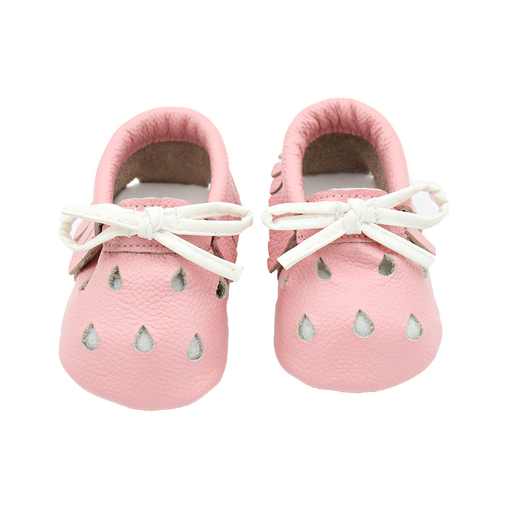 Baby sneakers with velcro straps in blue and white