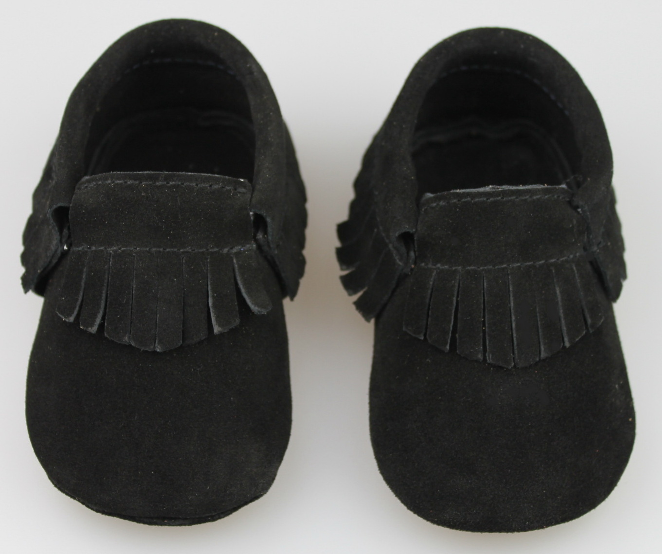 Pair of soft sole baby shoes made from natural materials
